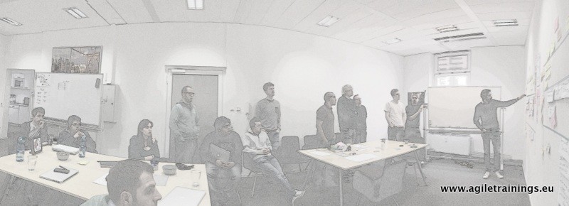 Product manager walking the room through goals, priorities and open questions on the product board